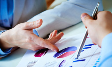 Photo of graphs showing insurance trends.